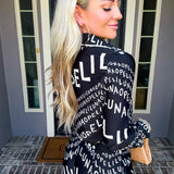 Runway Savage Graphic Blouse