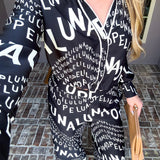 Runway Savage Graphic Blouse