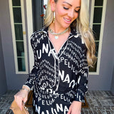 Runway Savage Graphic Blouse